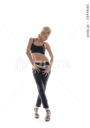 Athletic young woman posing in dance sport costume Athletic young woman posing in dance sport costume 3944680