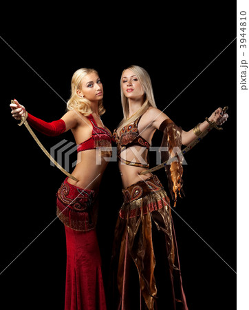 Two blond beauty girl stand with saber 3944810