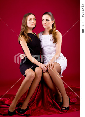 two sisters in black and white dress 3945218