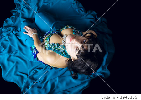 woman in blue costume look at you 3945355