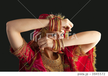 young girl in red indian costume closeup portrait young girl in red indian costume closeup portrait 3945572