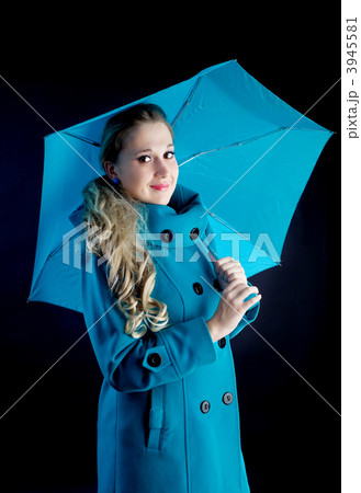 young girl with blue umbrella 3945581