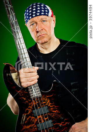 man with a guitar, bass player 3974494