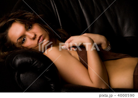 Brunette in lingerie looking into the lens Brunette in lingerie looking into the lens 4000590