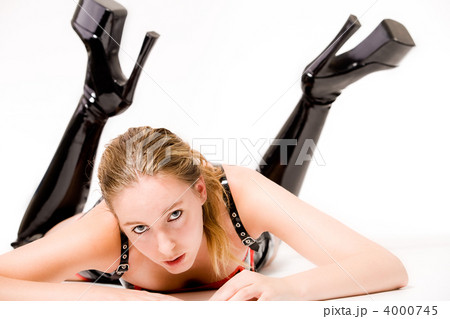 beautifull blond in laque clothing and high heeled boots beautifull blond in laque clothing and high heeled boots 4000745