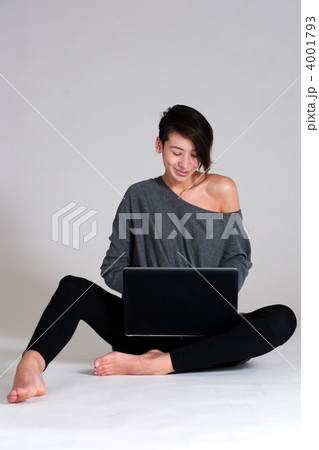 Young woman on floor with notebook Young woman on floor with notebook 4001793