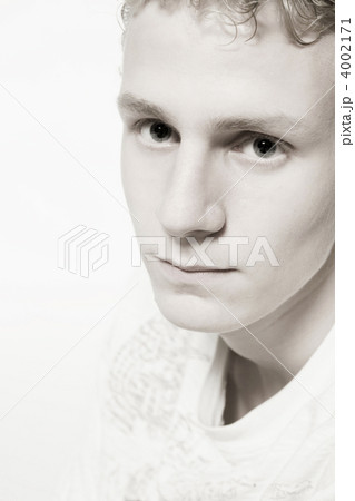 Young man looking aside Young man looking aside 4002171