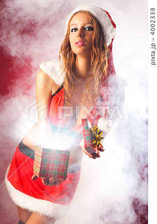 Young sexy woman in santa clothing 4002339