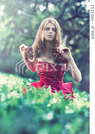 Young woman in red dress 4003232