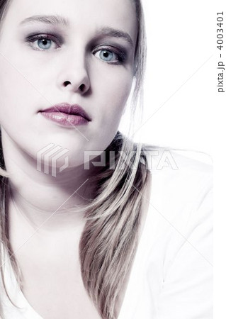 Portrait with a white blouse in a corner Portrait with a white blouse in a corner 4003401