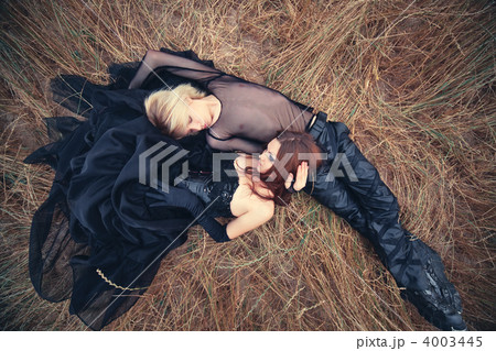 Young goth couple outdoors 4003445