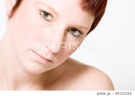 Studio portrait of a questionable looking young woman with short Studio portrait of a questionable looking young woman with short 4010293