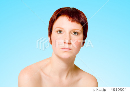 Studio portrait of a neutral looking young woman with short hair 4010304