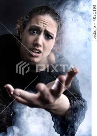 Woman with long curly hair begging 4021193