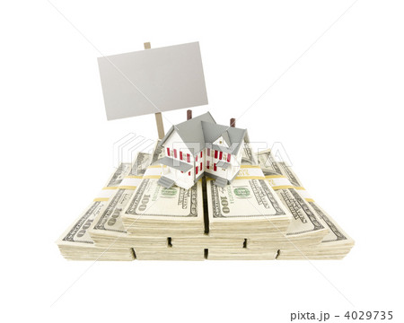 Small House on Stacks of Hundred Dollar Bills and Blank Sign 4029735