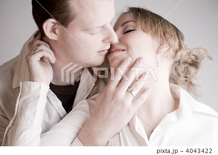 Portrait of a young kissing couple Portrait of a young kissing couple 4043422
