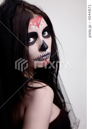 Depressed woman skull face art look at camera Depressed woman skull face art look at camera 4044871