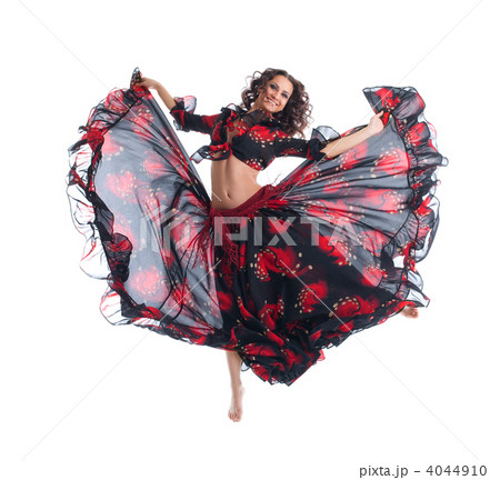 Beauty girl jump in gypsy dance isolated 4044910