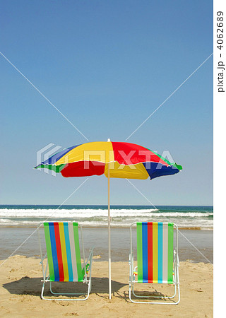 Beach chairs and umbrella Beach chairs and umbrella 4062689