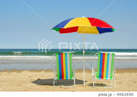 Beach chairs and umbrella Beach chairs and umbrella 4062690