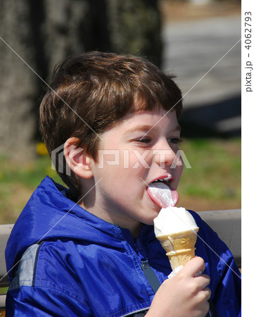 Boy licking ice cream Boy licking ice cream 4062793