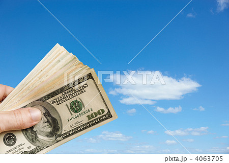 Hand holds up $100 bills 4063705