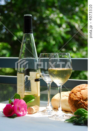 White wine with glasses outside 4073310