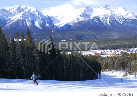Skiing in mountains 4075063