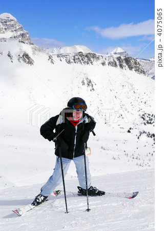 Skiing in mountains 4075065