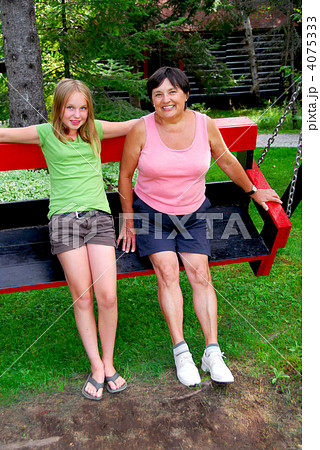 Family on swings Family on swings 4075333