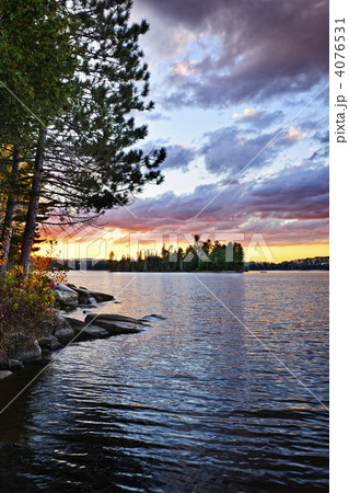 Dramatic sunset at lake 4076531