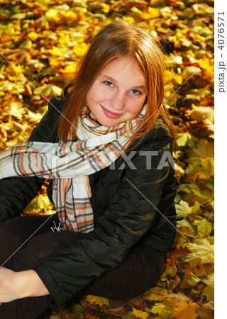 Girl in a fall park Girl in a fall park 4076571