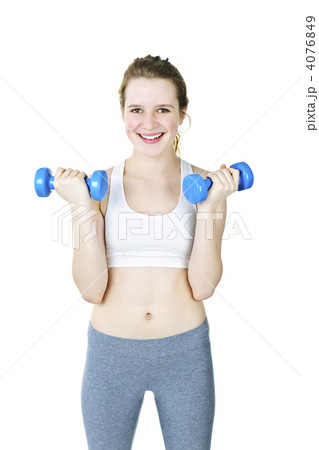 Happy active girl holding weights 4076849