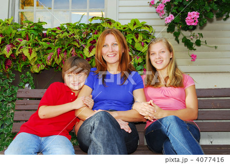 Family at a house 4077416