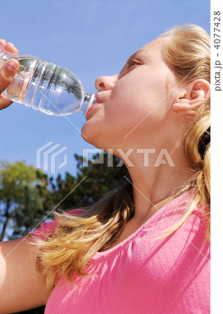 Girl drinking water Girl drinking water 4077428