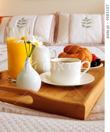 Breakfast on a bed in a hotel room 4083107