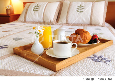 Breakfast on a bed in a hotel room 4083108