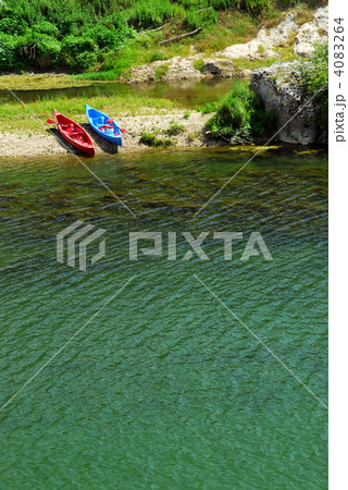 Kayaks on river bank Kayaks on river bank 4083264