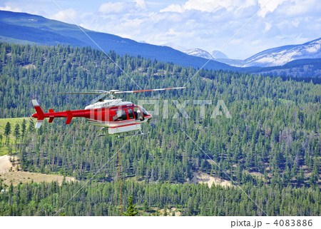 Rescue helicopter in mountains 4083886