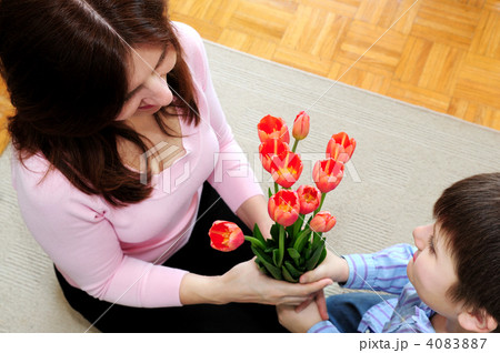 Mother and son with flowers Mother and son with flowers 4083887