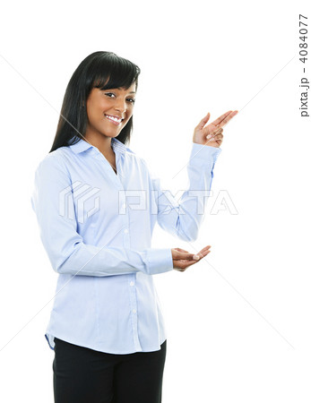 Smiling young woman pointing Smiling young woman pointing 4084077