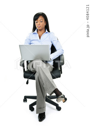 Woman sitting in office chair with computer 4084121