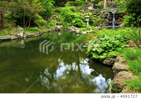 Cascading waterfall and pond 4091727