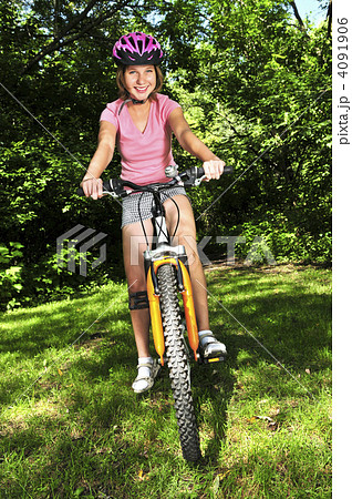 Teenage girl on a bicycle Teenage girl on a bicycle 4091906