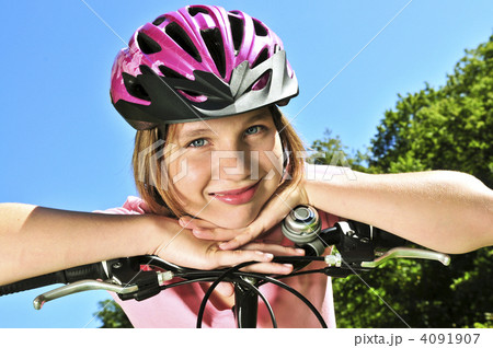 Teenage girl on a bicycle Teenage girl on a bicycle 4091907