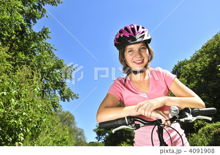 Teenage girl on a bicycle Teenage girl on a bicycle 4091908