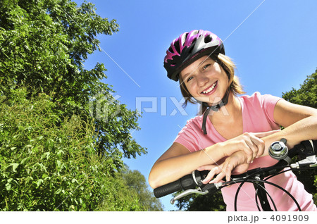 Teenage girl on a bicycle 4091909