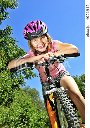 Teenage girl on a bicycle 4091912