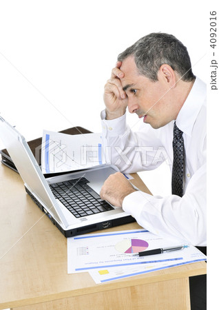 Businessman at his desk on white background 4092016