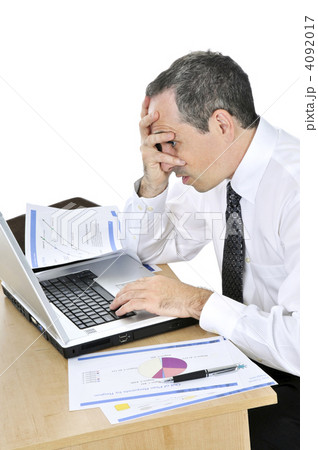 Businessman at his desk on white background 4092017